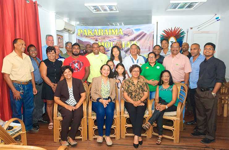 The ‘Safarians’ pose for a photo along with Minister within the Ministry of Indigenous Peoples’ Affairs, Valerie Garrido-Lowe (seated centre), along with a representative from the main sponsor, GuyOil (seated second from left) and GTA representative, Carla Persaud (seated second from right)