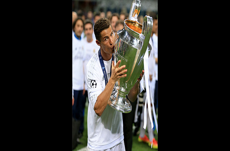 FLASHBACK! Real Madrid's Cristiano Ronaldo celebrates with the UEFA Champions League trophy after victory over Atletico Madrid.