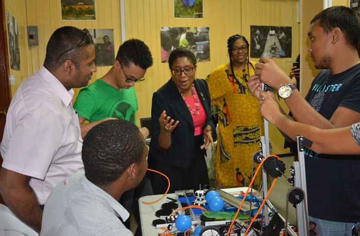 Members of STEMGuyana engaging with Minister of Public Telecommunications, Cathy Hughes recently