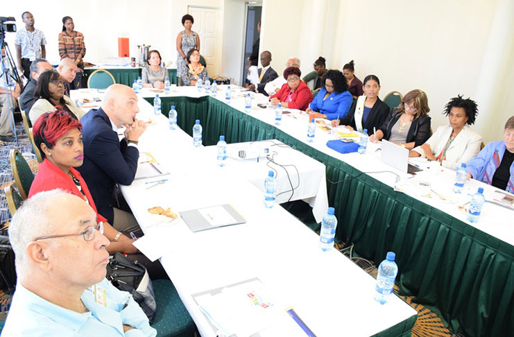 First Lady Sandra Granger (centre), Government Ministers and members of the UN seated among the table of the panel discussion on School Feeding Program at Pegasus Hotel. (Photo credit: GINA)