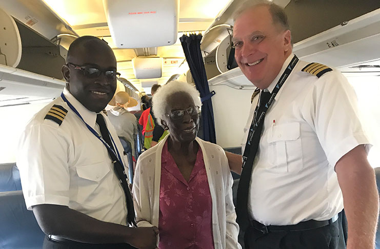 With captain Robert Lewis (right) and First Officer Chevon Smith.