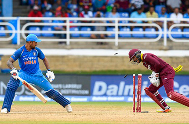 India openerr Shikhar Dhawan finds himself stumped by wicketkeeper Shai Hope off off-spinner Ashley Nurse (out of photo). (Photo courtesy CWI Media)
