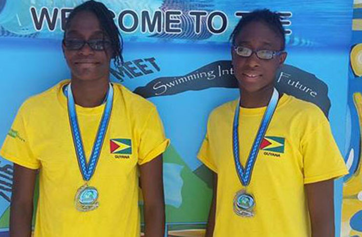 Twin sisters Jadyn and Danielle George who medalled at Goodwill Swim Meet in 2016