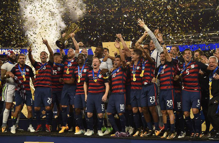The USA team celebrate winning the final football game of the 2017 CONCACAF Gold Cup against Jamaica.