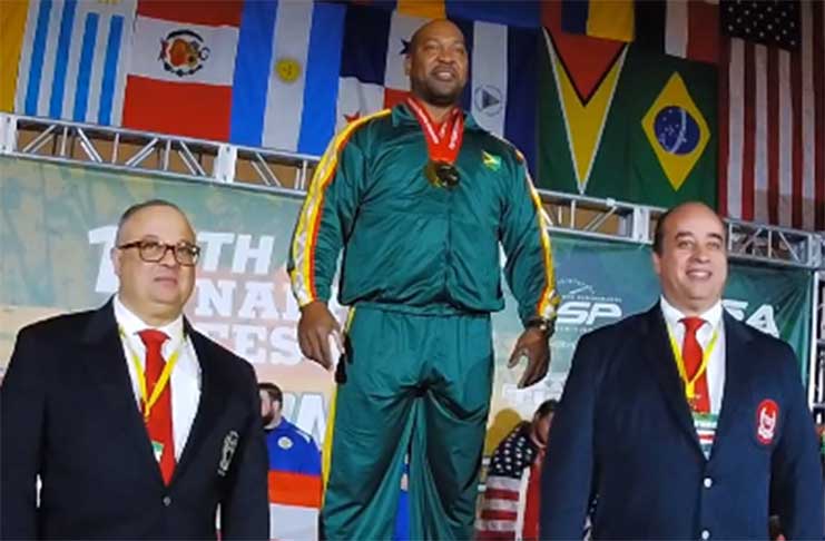 Guyana’s John Edwards stands tall after receiving his three gold medals