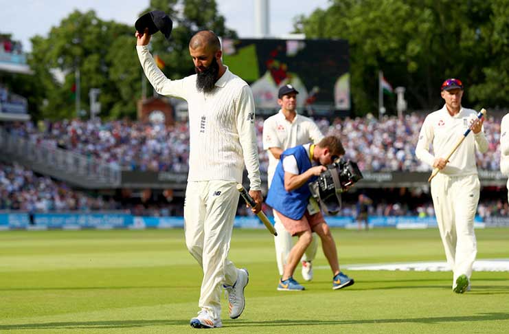 Player of the match Moeen Ali leads England from the field after wrapping up victory in the first Test. Ali claimed ten wickets in the Lord’s Test.