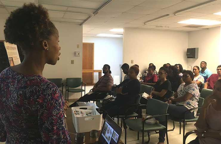 Nutrition Educator, Ms. Lambert, lecturing to  workshop participants at Project Dawn on Sunday, June 25th