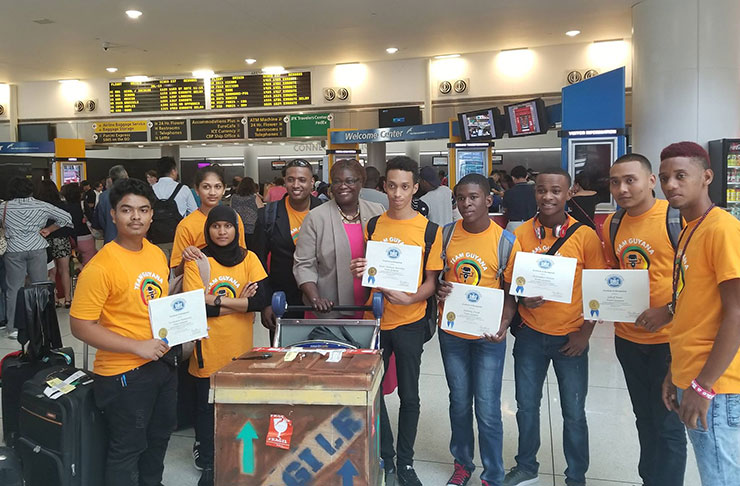 Team Guyana is greeted by US Senator, Roxanne Persaud, upon their arrival at the JFK International Airport (STEM Guyana/ Roxanne Persaud photo)