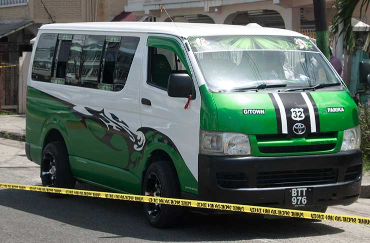 Tedroy James’ bus at the spot where the incident occurred (Photo by Delano Williams)