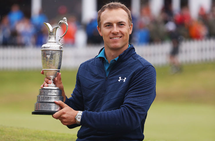 USA’s Jordan Spieth celebrates with The Claret Jug after winning The Open Championship