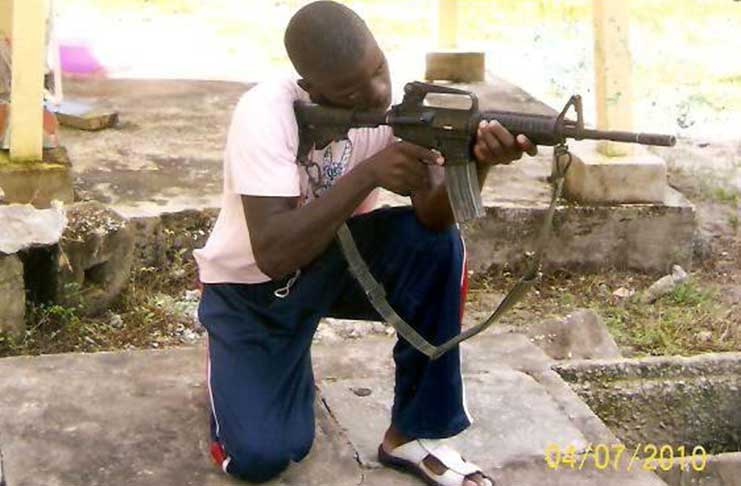 A 2012 photo of Uree Varswyck with a gun. During that time he served as a TSU rank