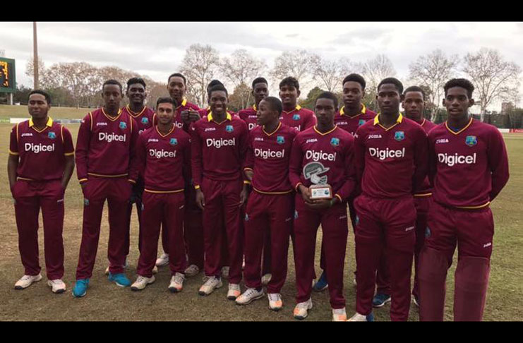 Windies Under-19s celebrate with their one-day trophy.