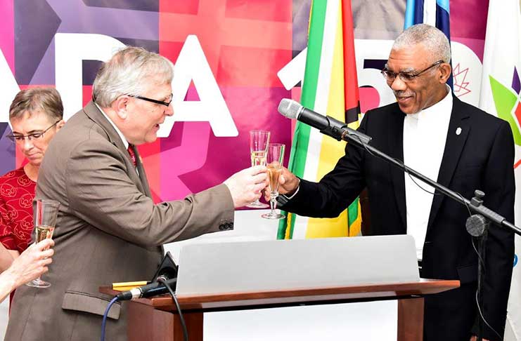 President David Granger and Canada’s High Commissioner to Guyana, Mr. Pierre Giroux share a toast at the reception to commemorate the 150th Anniversary of the Canada Confederation 