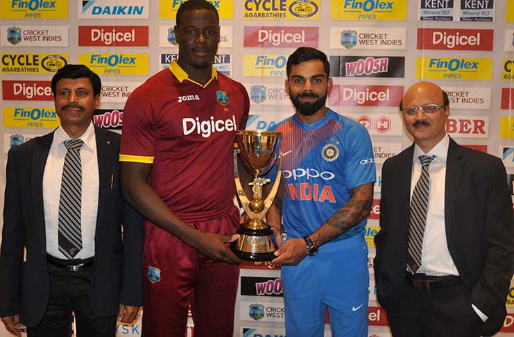 Captains Carlos Brathwaite and Virat Kohli hold the trophy. With them are: Bhanudas Mehta, Vice President Commercial of Finolex Industries and Saurabh Dhanorkar, Director of Finolex Industries.