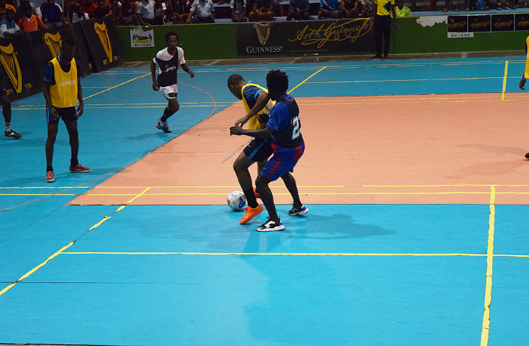 Part of the action on the opening night of the Guinness ‘Cage’ football Championship