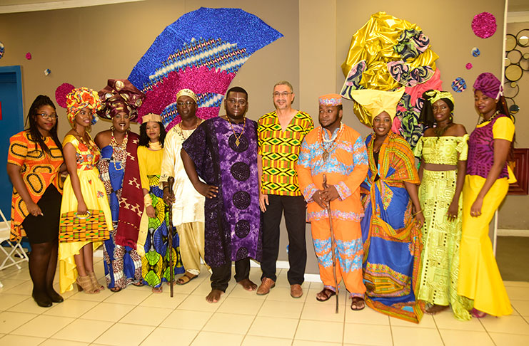 ourts staff as they displayed their African attire for patrons on Monday (Photo by Adrian Narine)