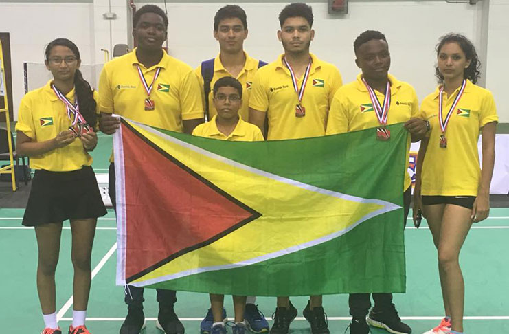 Team Guyana pose with their medals.