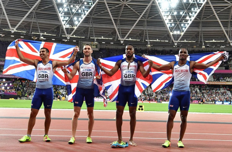 Britain's gold medal winning relay team, Chijindu Ujah (right), Adam Gemili (left), Daniel Talbot (2nd left) and Nethaneel Mitchell-Blake (2nd right) ...