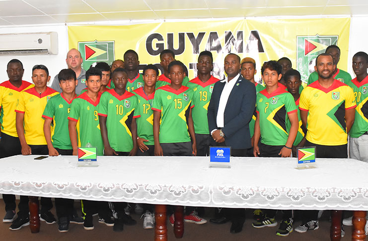 The National U-15 team with officials from the Guyana Football Federation yesterday. (Samuel Maughn photo)