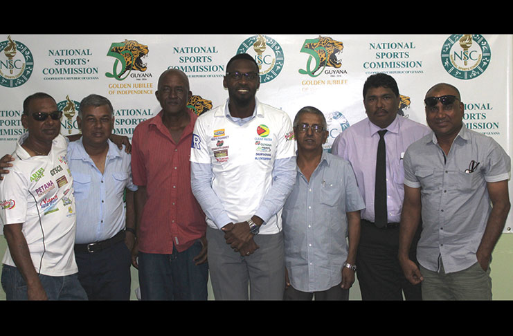 In photo, members of Guyana Floodlight Softball Cricket Association pose with Christopher Jones. (From left) Ramesh Sunich (vice-president), Lakhram Singh (treasurer), Wayne Jones (organising secretary), Director of Sport Christopher, Ramchand Ragbeer (president), Anil Beharry (assistant secretary), Ricky Deonarain (club captain).