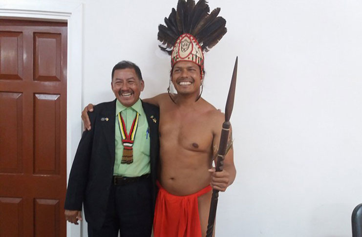 Vice-President and Minister of Indigenous People’s Affairs, Sydney Allicock, sharing a light moment with the NTC Vice-Chairman, Lennox Shuman, on Friday on the sidelines of the 2017 NTC Conference at the CPCE