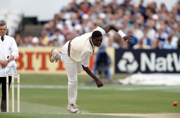 Patrick Patterson in full flight as umpire Harold 'Dickie' Bird looks on // Getty