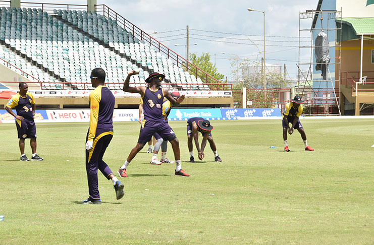 The Trinbago Knight Riders go through some of their paces at yesterday’s net session. (Photos: Adrian Narine)