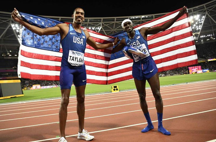 Christian Taylor of the U.S. and Will Claye of the U.S. celebrate.