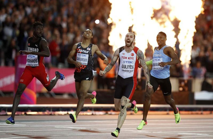 Ramil Guliyev of Turkey celebrates winning the 200 metres gold.