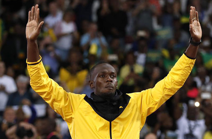Usain Bolt of Jamaica during a lap of honour. (Phil Noble)