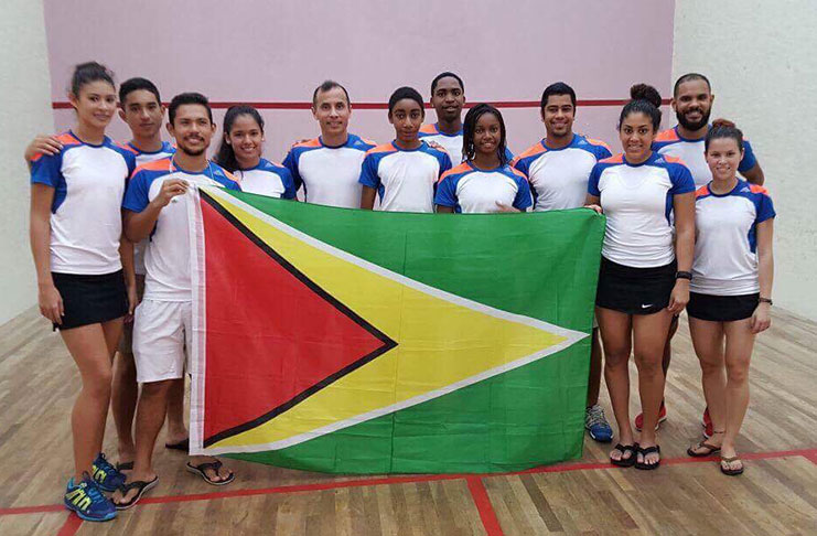 CHAMPIONS! Guyana’s male and female teams after capturing the Senior Caribbean Squash Championship in St Vincent and the Grenadines