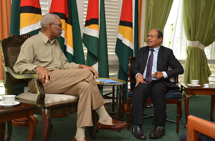 President David Granger in discussion with Mr. R. Veeramani during their meeting at State House