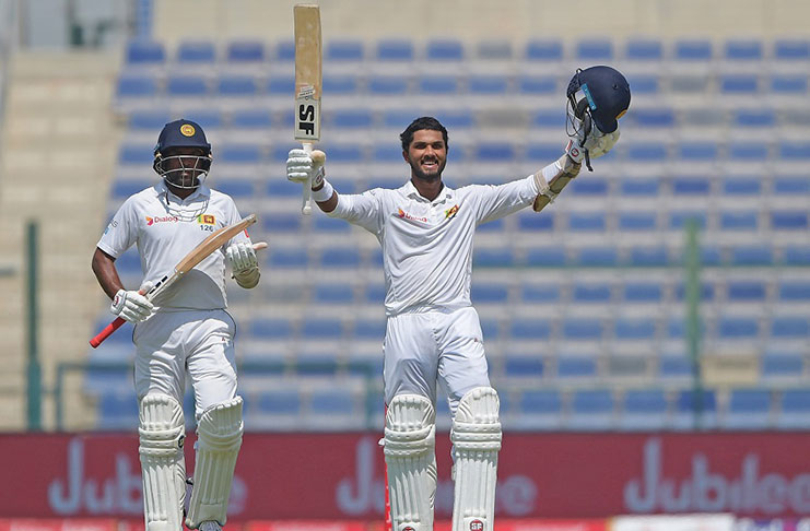 Dinesh Chandimal went on to score his first century as Test captain. (Tom Dulat/Stringer)