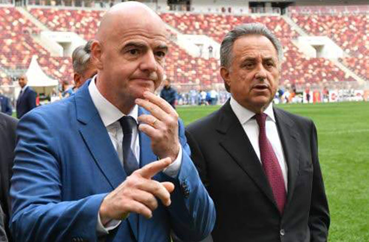 FIFA president Gianni Infantino (left) and Russian Deputy Prime Minister and Local Organising Committee chairman Vitaly Mutko walk on the pitch after the ceremony for the opening of the FIFA World Cup Trophy tour at Luzhniki stadium in Moscow on September 9, 2017. (Photo: AFP)