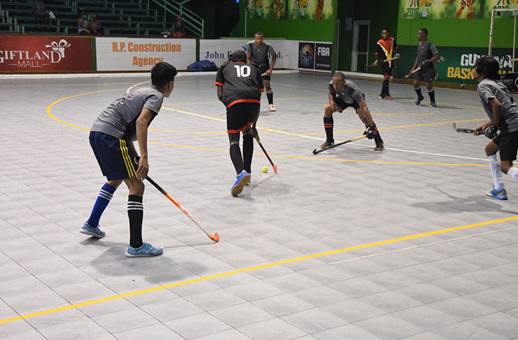 Part of the Men’s action between the National Blacks and the Saints Hockey Club