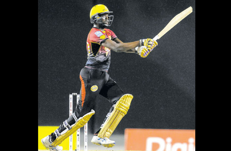 Kevon Cooper of Trinbago Knight Riders hits 4 during the Final of the 2017 Hero Caribbean Premier League at Brian Lara Cricket Academy in Tarouba, on Saturday.