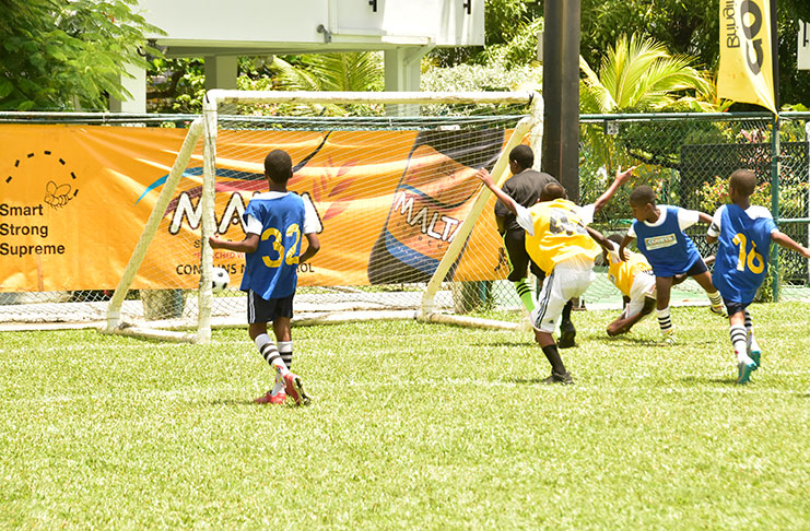 One of the many goals scored during the opening round of the COURTS Pee Wee Football tournament. (Adrian Narine Photo)