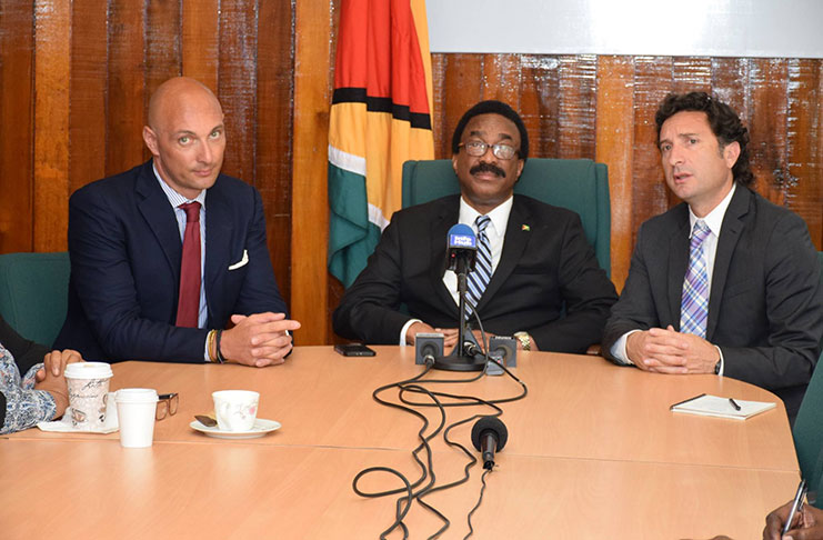 Minister of Legal Affairs, Basil Williams, is flanked by UNICEF deputy representative, Paolo Marchi (left) and HHCH regional representative, Ignacio Goicoechea