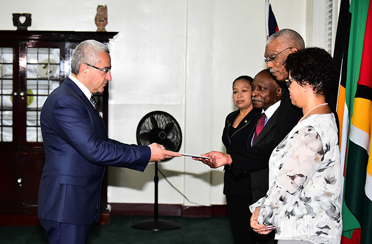 Azerbaijan's Ambassador to Guyana, Elkhan Polukhov presenting his Letter of Credence to President David Granger