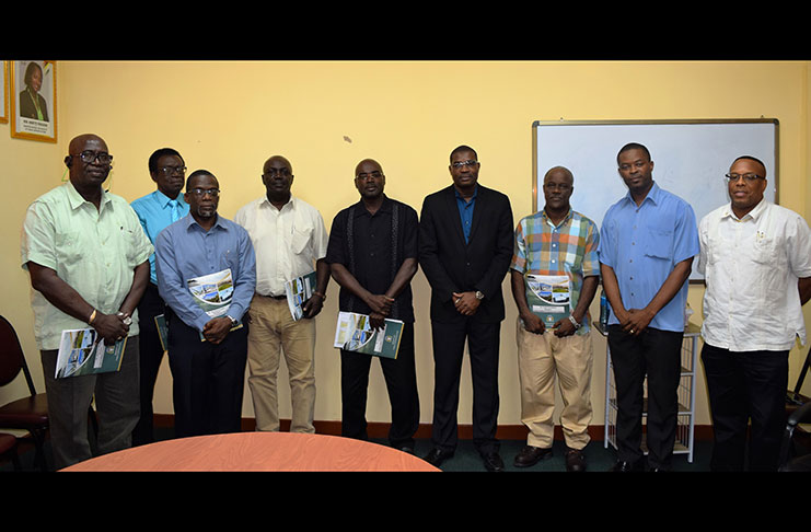 Minister of Public Infrastructure, David Patterson (fourth, right); Permanent Secretary of the Ministry of Public Infrastructure, Mr. Kenneth Jordan (far right); and Mayor of Linden, Mr. Carwyn Holland (second right), with the new members of the Linden Utility Company Board. The board members are (left to right): Mr. Mortimer Mingo; Mr. Elwyn Marshall; Mr. Renford Homer (GPL representative); Mr. Horace Williams; Mr. Tracy Johnson (Chairman); and Mr. Leslie Gonsalves