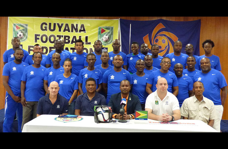 (sitting L-R) CONCACAF Instructors, Vincent Earl Ganzberg and Anton Corneal; GFF President, Wayne Forde and Technical Director, Ian Greenwood.