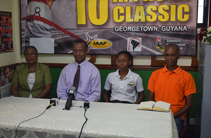 The Head table at the launch of the South American 10K Classic Road Race, from left, Tournament Coordinator, Yvonne October, AAG President Aubrey Hutson, Registration Coordinator, Carolyn Adams and LOC Secretariat Manager, James Cole