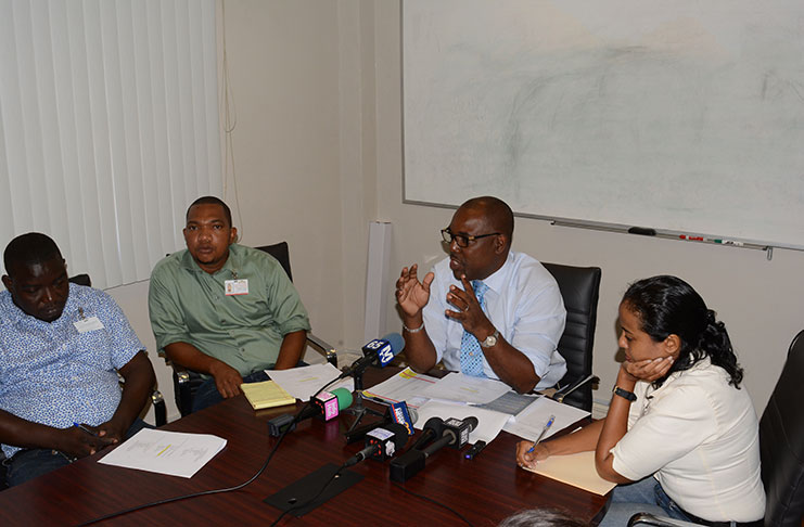 DHBC General Manager Rawlston Adams is flanked by engineers  Diane Lopes (right), Christopher Grannum (left) and Andre Crowder, who will be working on the bridge on Saturday