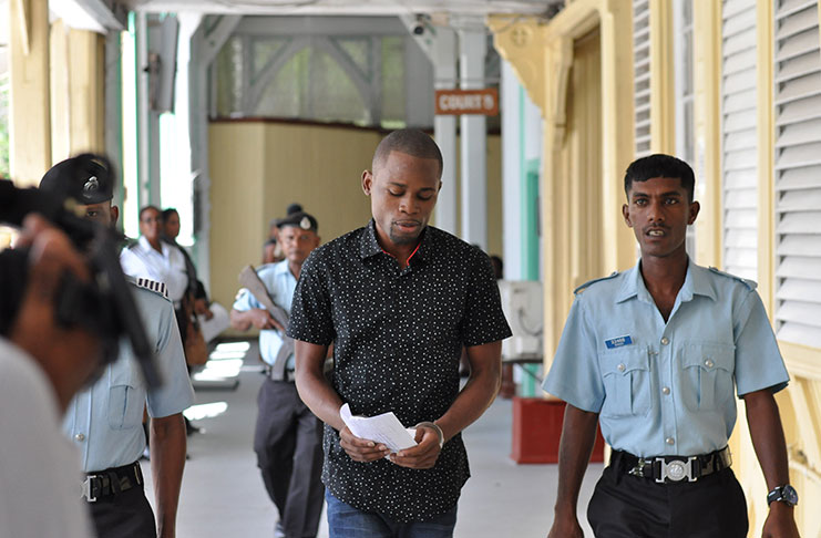 Stafrei Alexander being led into the courtroom