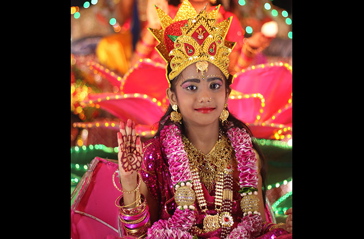 A young girl dressed at Goddess Lakshmi