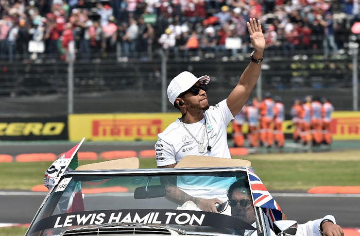 Lewis Hamilton is now Britain’s most successful racing driver of all time (AFP Photo/YURI CORTEZ )