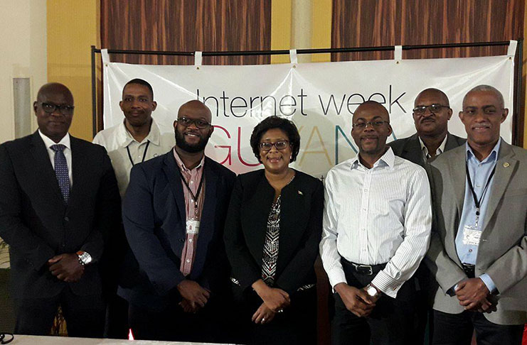 Minister of Public Telecommunications, Ms Catherine Hughes (centre) and her advisor, Mr Lance Hinds (second right) with representatives of the regional and international organisations here for ‘Internet Week’