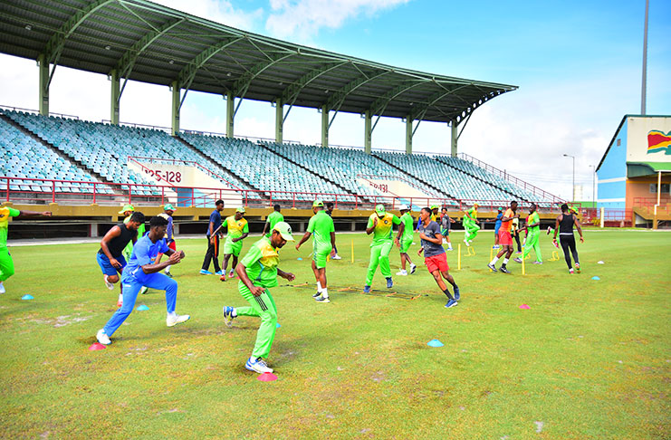 The Guyana Jaguars squad and other potential players during yesterday’s training session at the Guyana National Stadium, Providence. (Samuel Maughn photo)