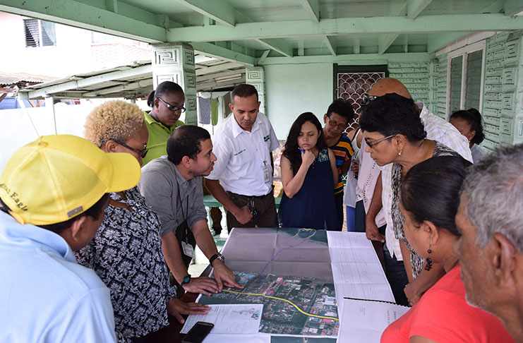  MPI Senior Engineer Mr Ronald Roberts explaining the alignment details for the new bridge to Houston residents during a recent engagement with the community ( Photo courtesy of the MPI)