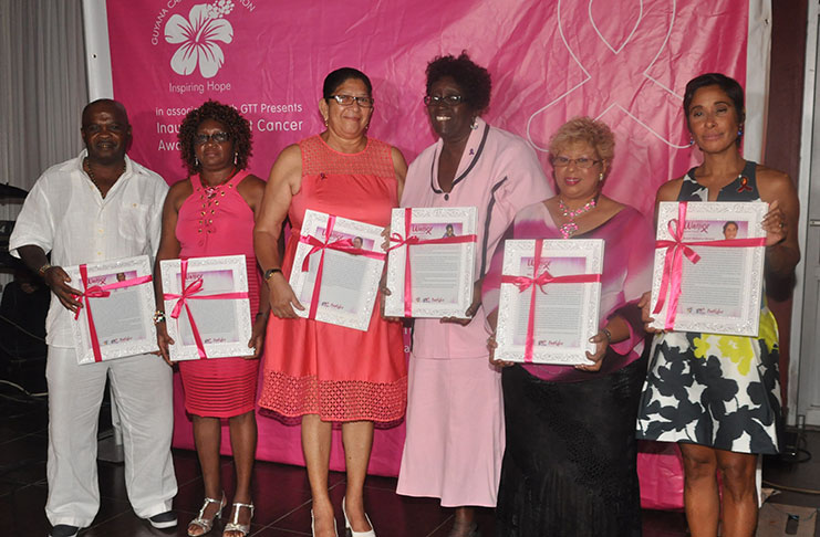 The persons who were awarded with ‘warriors against breast cancer’ frames at the GTT ‘Pinktober’ benefit Tuesday evening (Photo by Delano Williams)